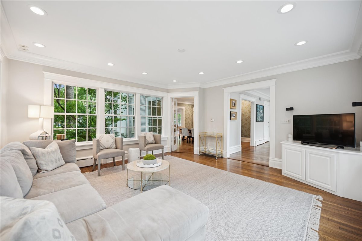 755 Lincoln Avenue Winnetka, IL 60093 - Photo 22 of 52 a living room with furniture and a flat screen tv