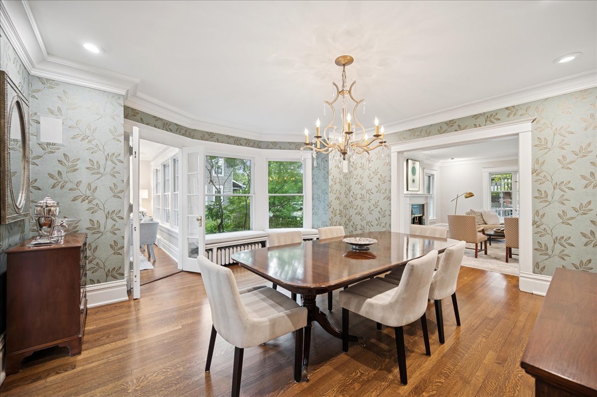 755 Lincoln Avenue Winnetka, IL 60093 - Photo 24 of 52 a view of a dining room with furniture window and wooden floor