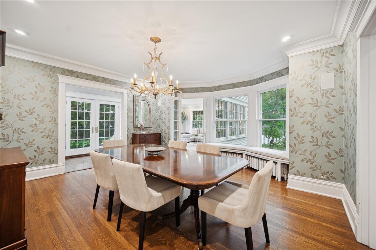 755 Lincoln Avenue Winnetka, IL 60093 - Photo 25 of 52 a view of a dining room with furniture window and wooden floor