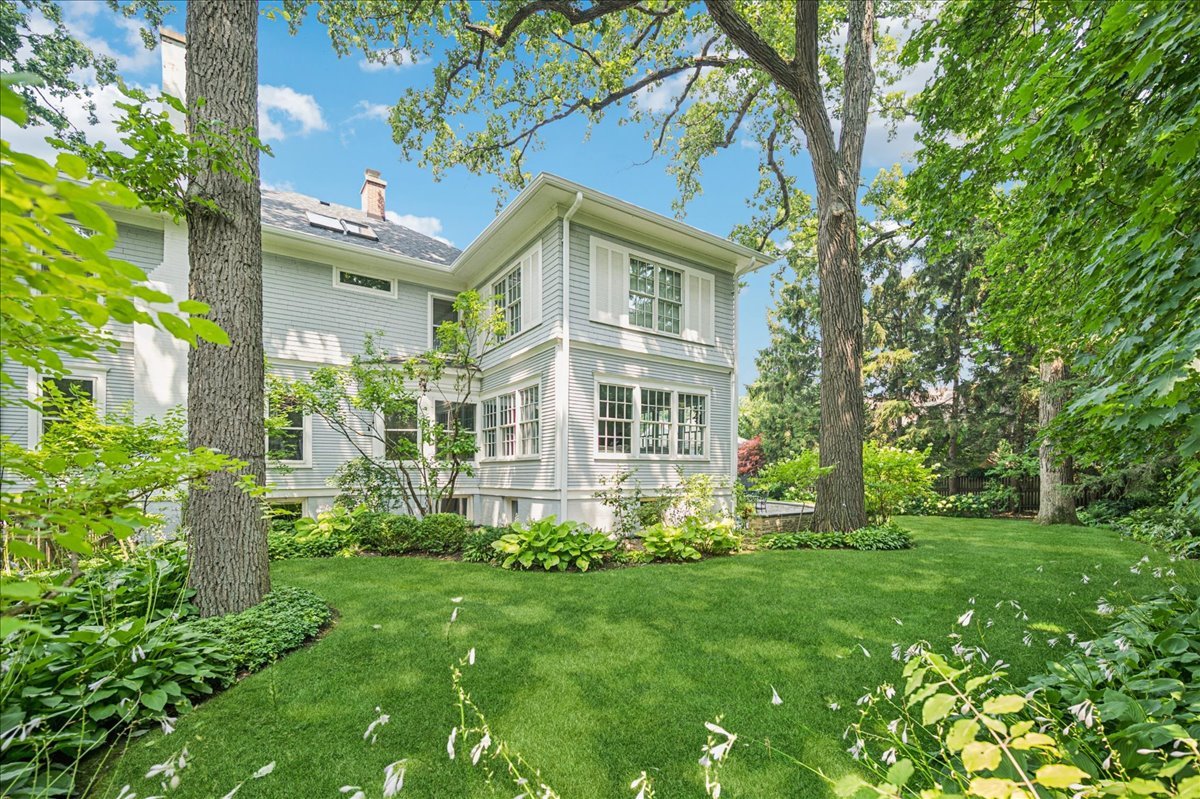 755 Lincoln Avenue Winnetka, IL 60093 - Photo 40 of 52 a front view of a house with a yard