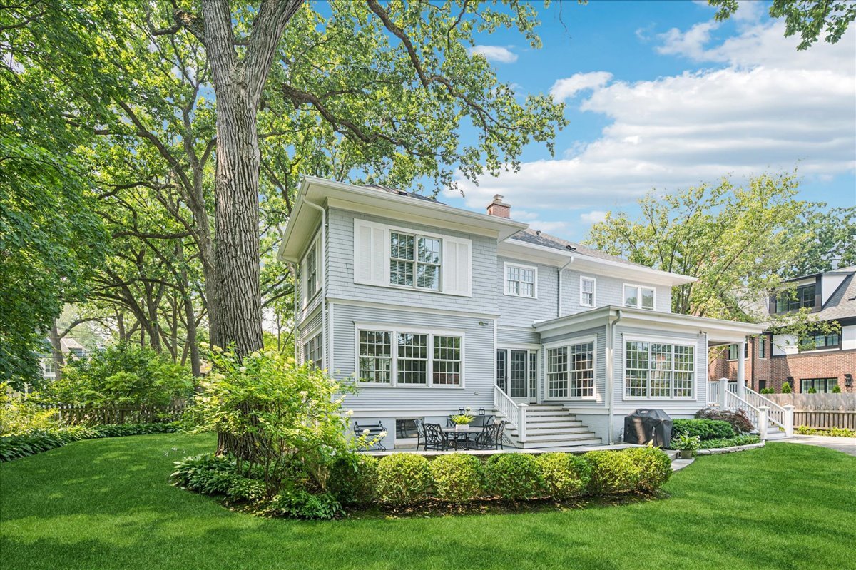 755 Lincoln Avenue Winnetka, IL 60093 - Photo 41 of 52 a front view of a house with a yard