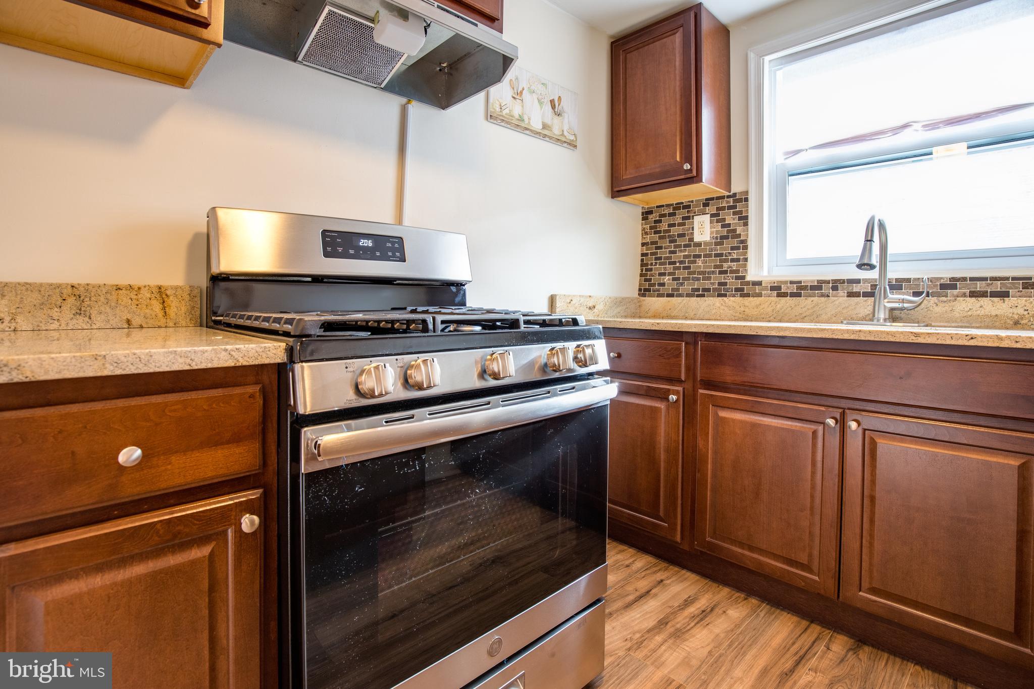 7436 Gilbert Street Philadelphia, PA 19138 - Photo 3 of 23 Brand New Stainless Steel Stove