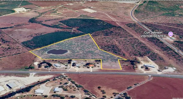 a view of a backyard of the house