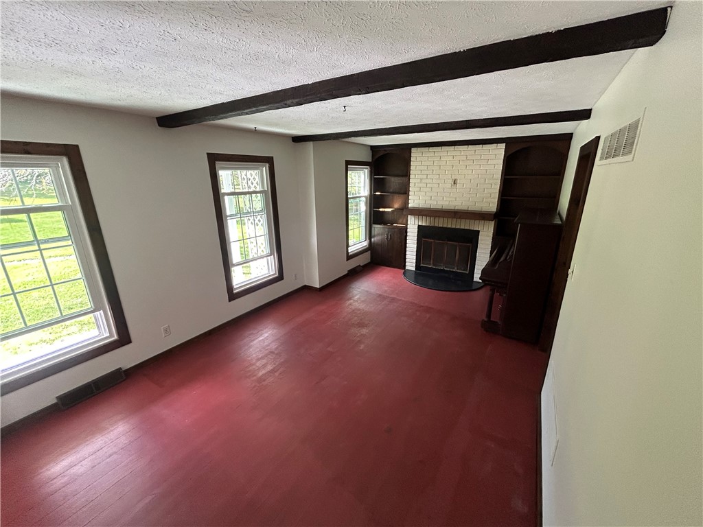 120 Starkey Point Road Starkey, NY 14837 - Photo 24 of 48 Main Floor Den with Fireplace