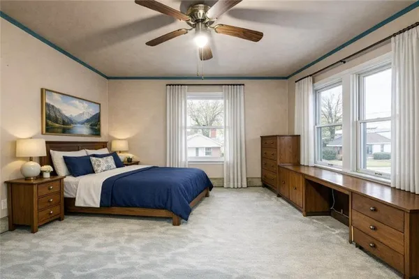 a bedroom with bed and window