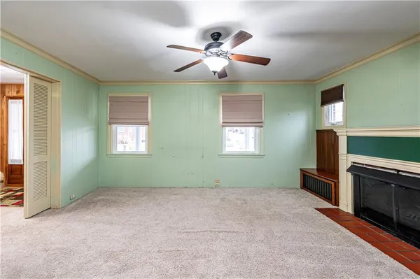 a room with window and fireplace