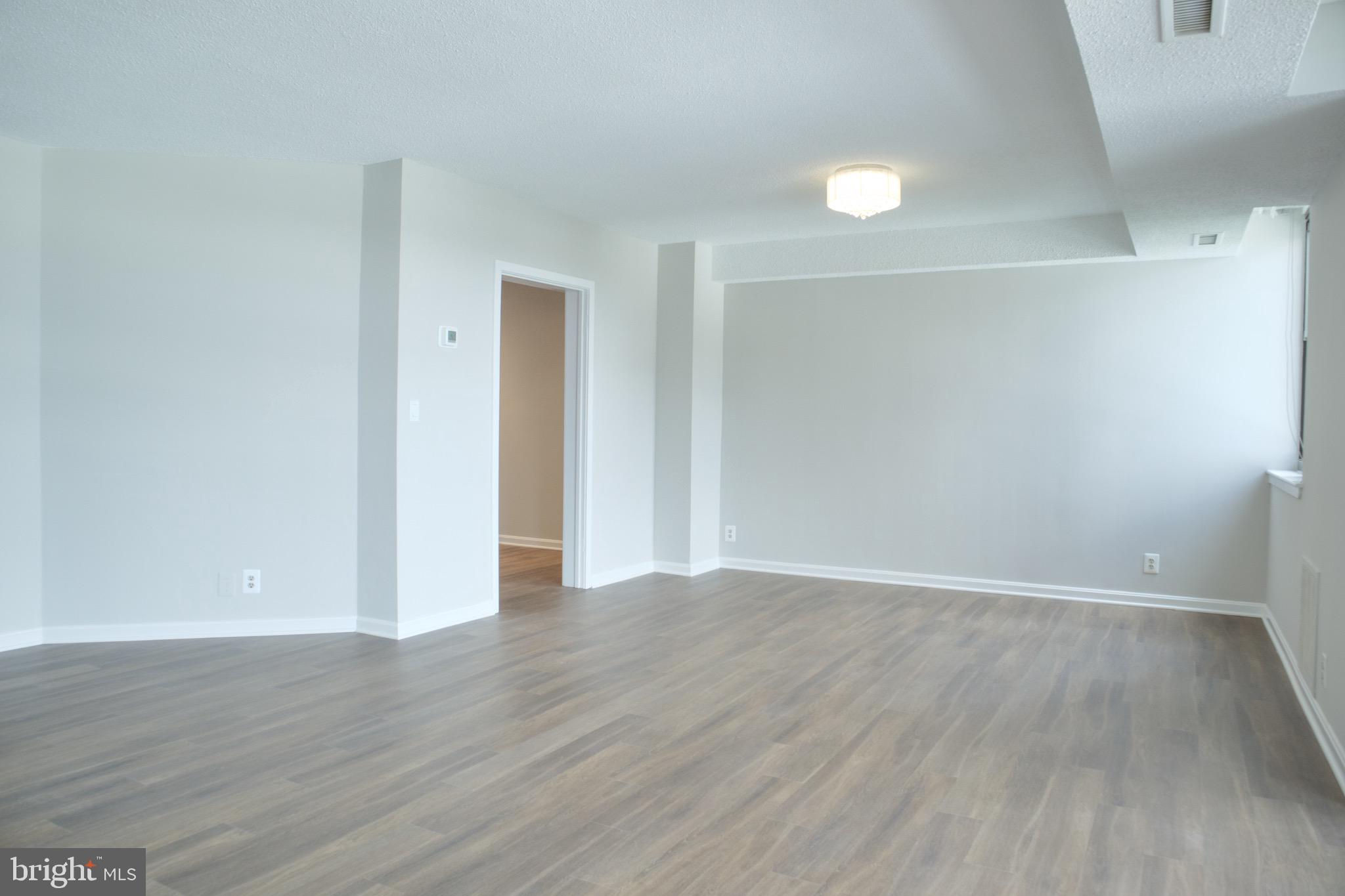 5505 Seminary Road, Unit 1210N Falls Church, VA 22041 - Photo 11 of 38 a view of an empty room with wooden floor