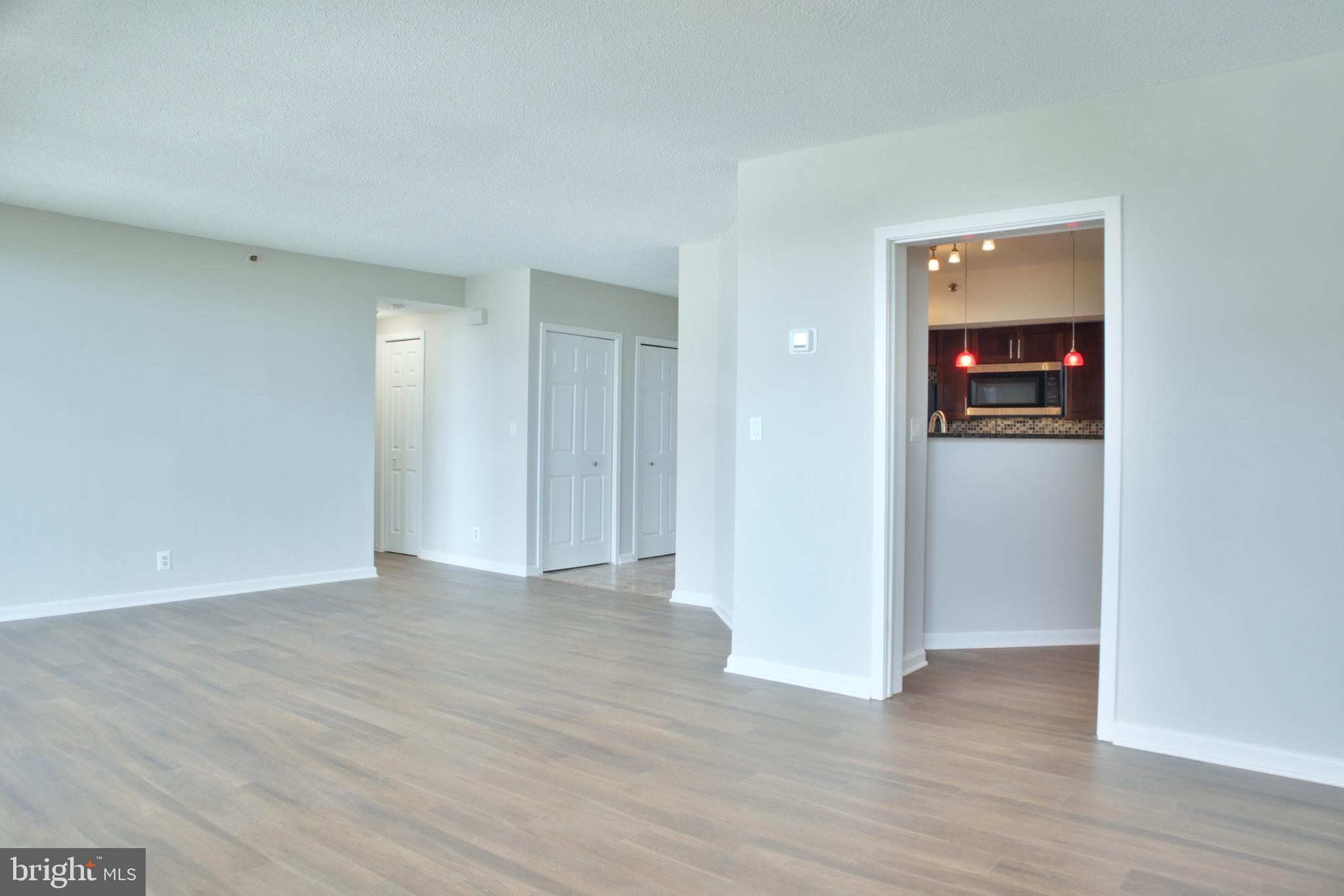 5505 Seminary Road, Unit 1210N Falls Church, VA 22041 - Photo 12 of 38 a view of empty room with wooden floor
