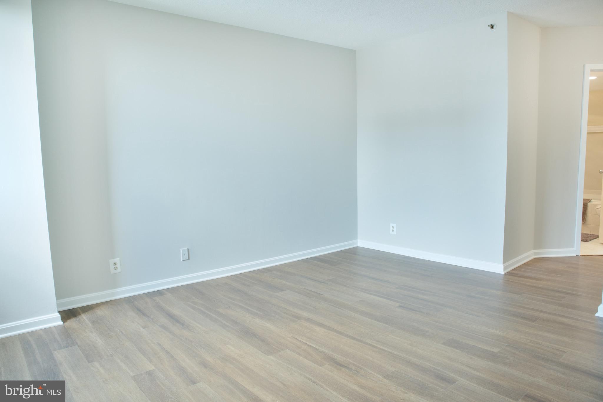 5505 Seminary Road, Unit 1210N Falls Church, VA 22041 - Photo 23 of 38 a view of an empty room with wooden floor