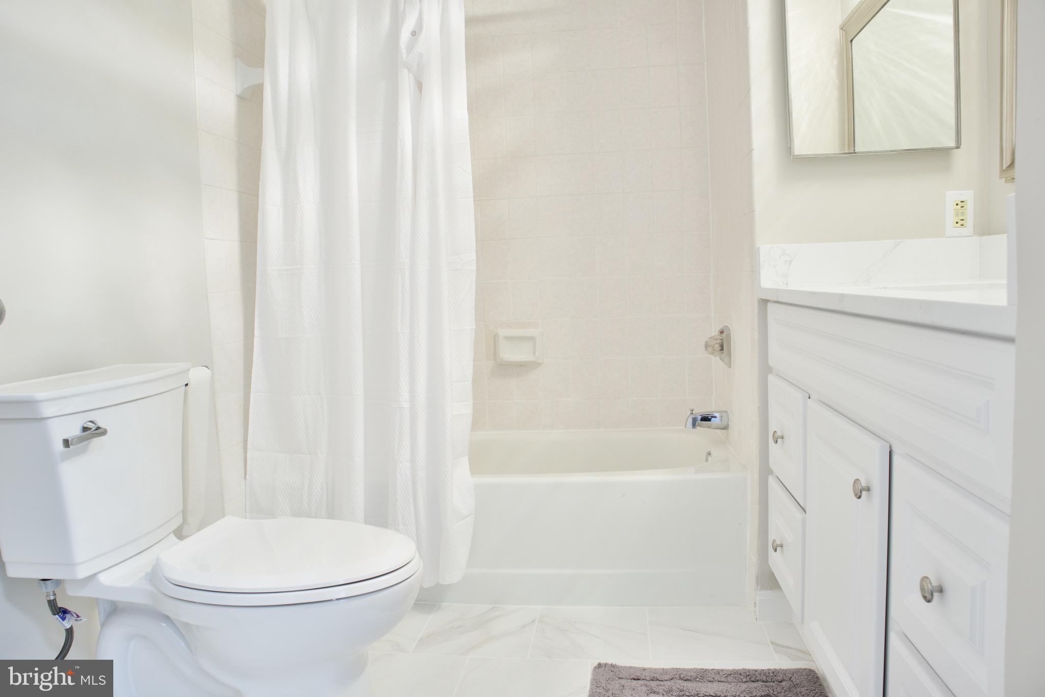 5505 Seminary Road, Unit 1210N Falls Church, VA 22041 - Photo 29 of 38 a bathroom with a toilet and a shower