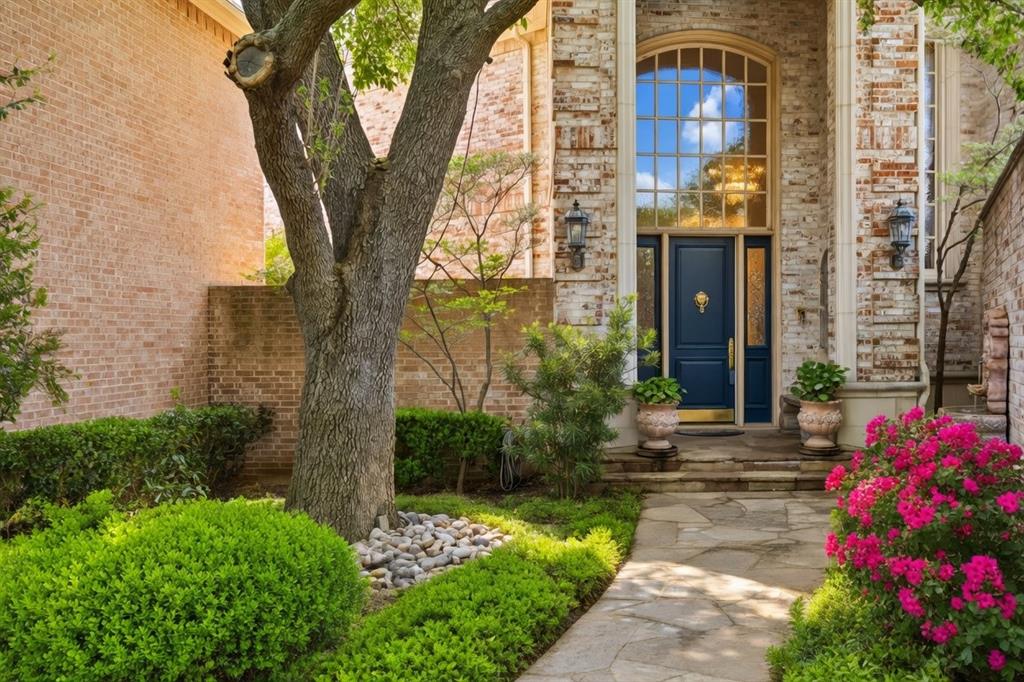 7 Ashmere Court Dallas, TX 75225 - Photo 1 of 1 a front view of a house with a yard