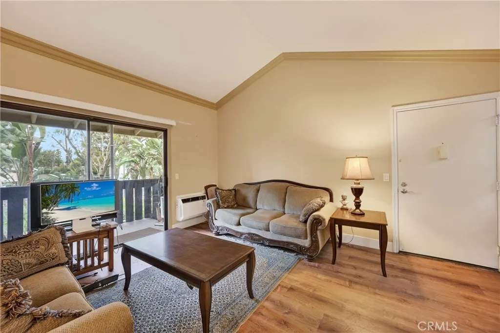 3535 Banbury Drive, Unit 94 Riverside, CA 92503 - Photo 3 of 21 a living room with furniture and a large window