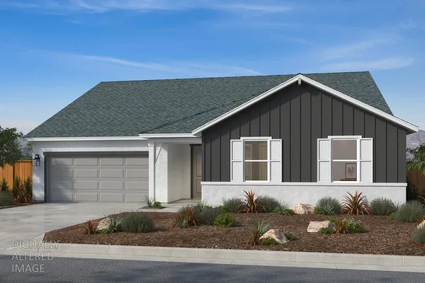 a front view of a house with garage and garage