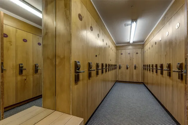a view of a hallway with a dining area