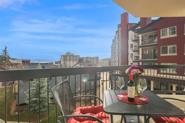 a view of balcony and dining room