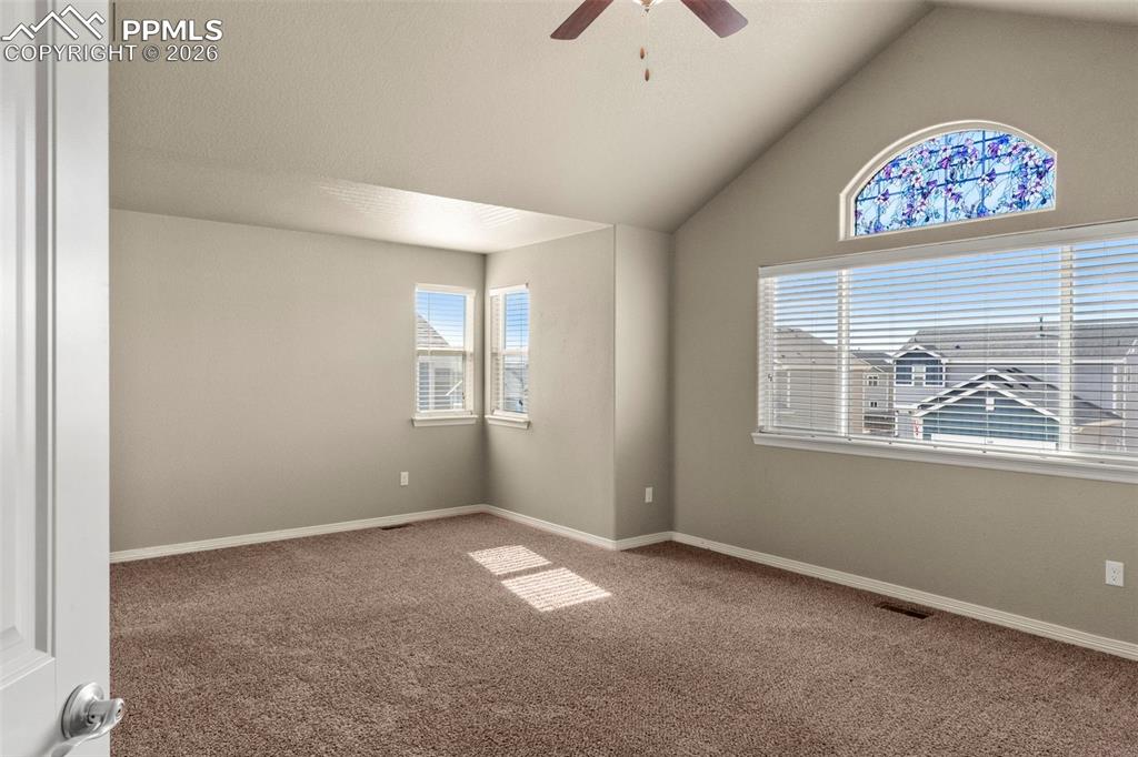 6105 Fiddle Way Colorado Springs, CO 80925 - Photo 15 of 40 a view of an empty room with a window