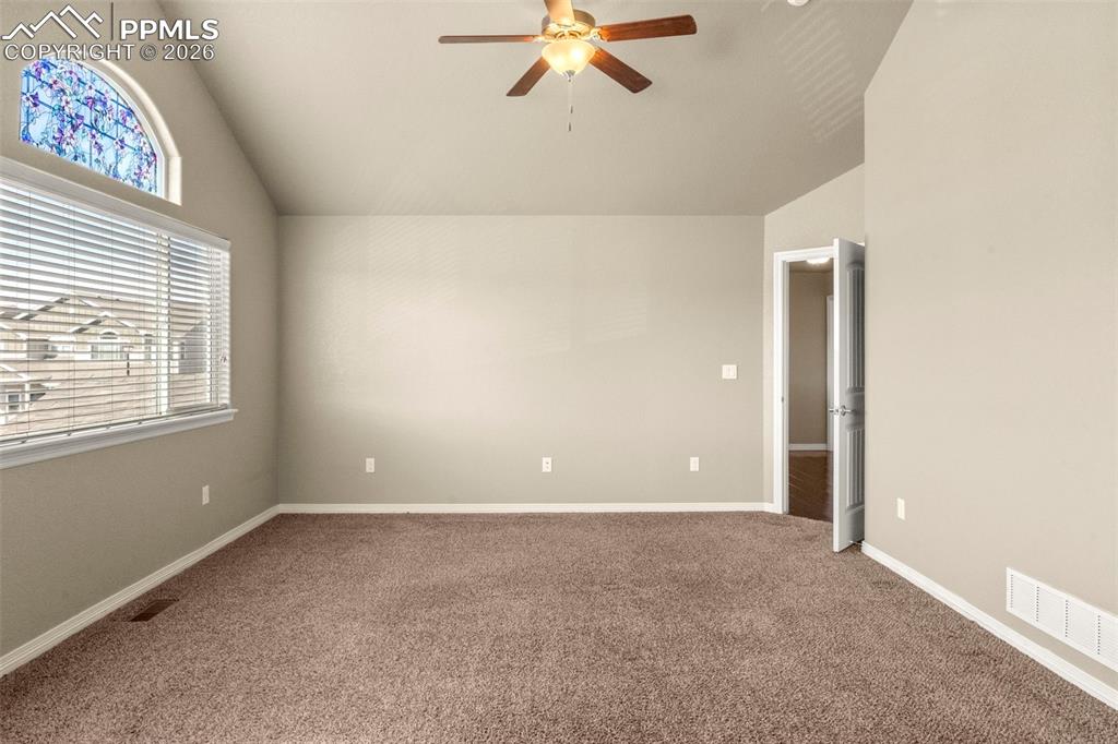 6105 Fiddle Way Colorado Springs, CO 80925 - Photo 16 of 40 a view of an empty room with a window