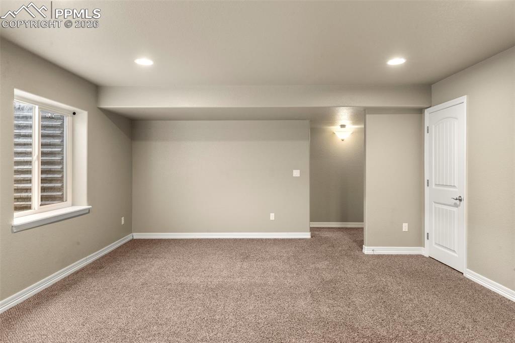 6105 Fiddle Way Colorado Springs, CO 80925 - Photo 26 of 40 an empty room with windows and closet