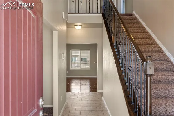 a view of an entryway with staircase