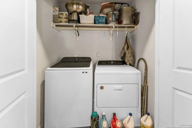 a utility room with dryer and washer