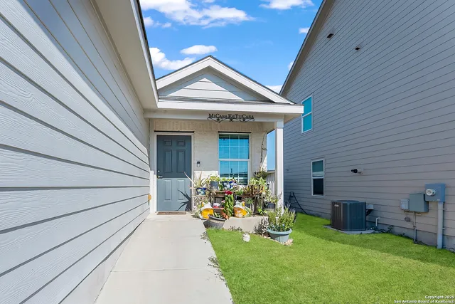 a front view of house with yard