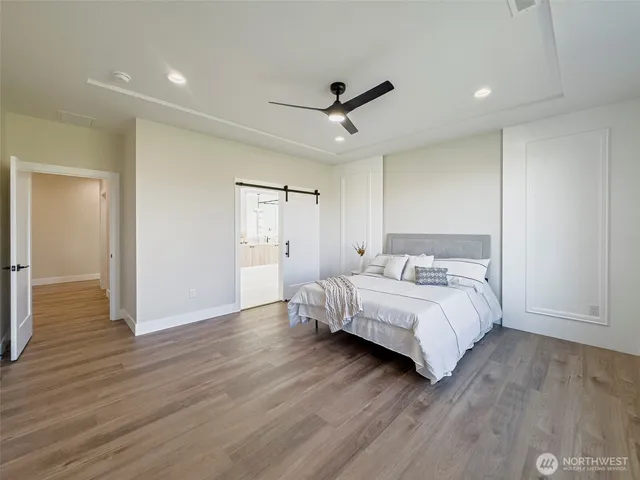 a large bathroom with a double vanity sink mirror and double