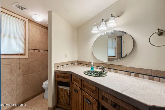 a view of a room with a large window