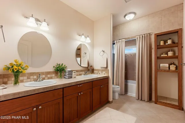 a work room with furniture and a window