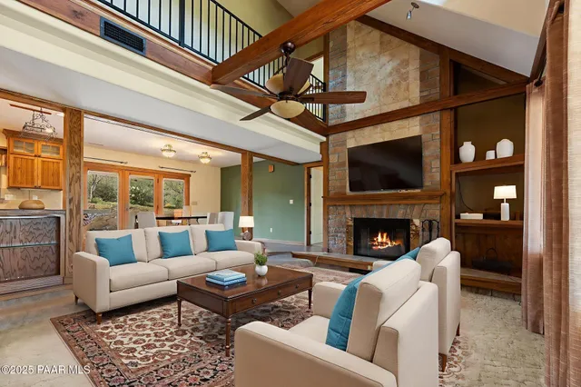 a kitchen with a sink cabinets and wooden floor