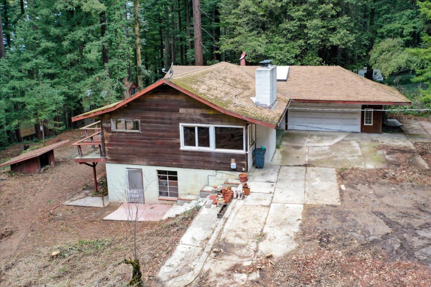 104 Ware Road Woodside, CA 94062 - Photo 3 of 14 a aerial view of a house with a yard and balcony