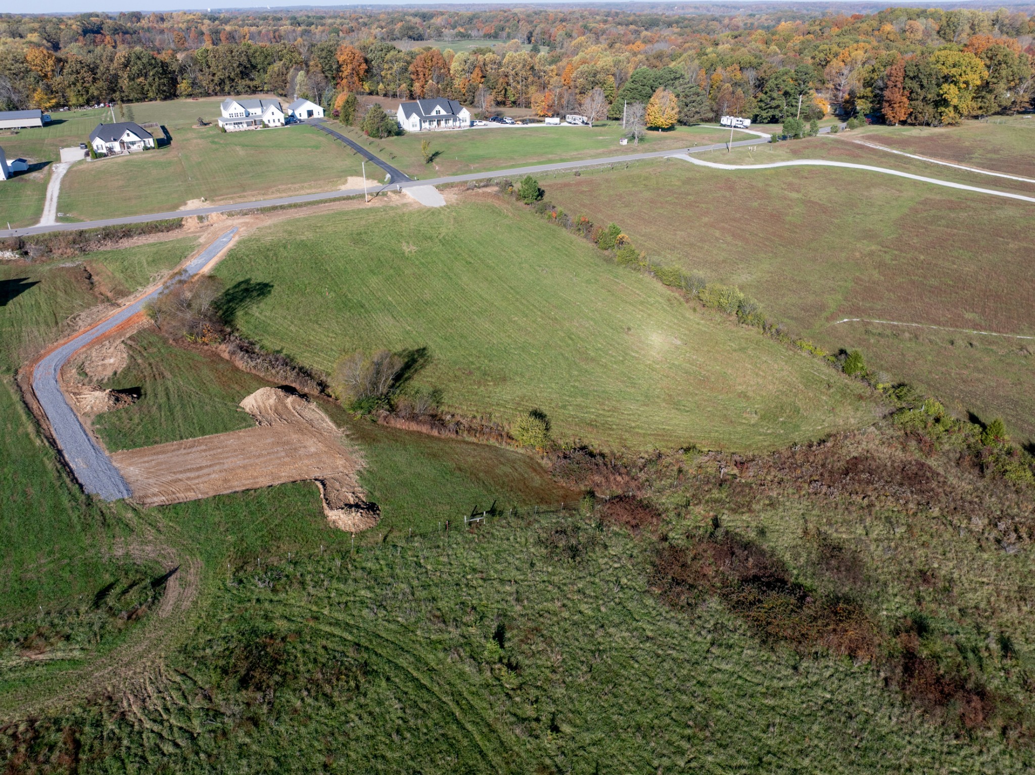 555 Buddy Road Burns, TN 37029 - Photo 17 of 23 an aerial view of a house with a yard and lake view