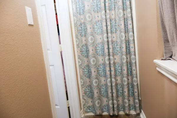 an aerial view of residential house with outdoor space