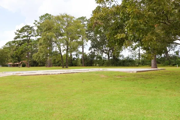 a view of an outdoor space and tennis court