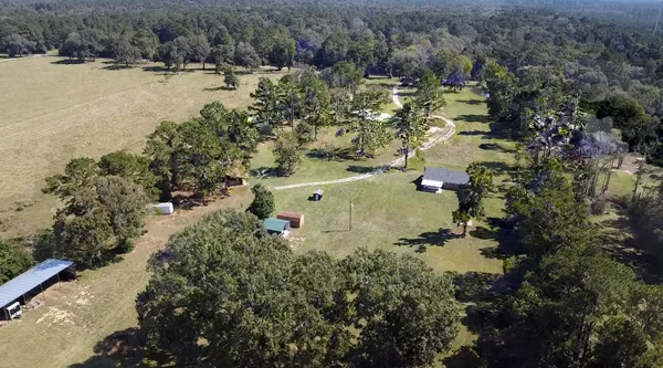 a view of a lake with a yard