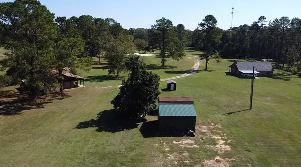 $999,000 | 697 County Road 2309, Cleveland, TX 77327