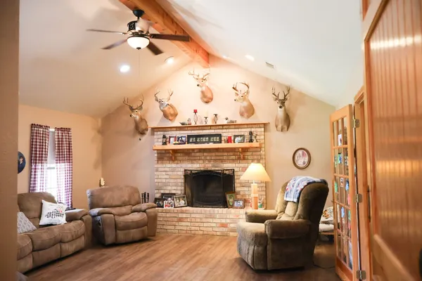 a kitchen with stainless steel appliances granite countertop a stove and a refrigerator