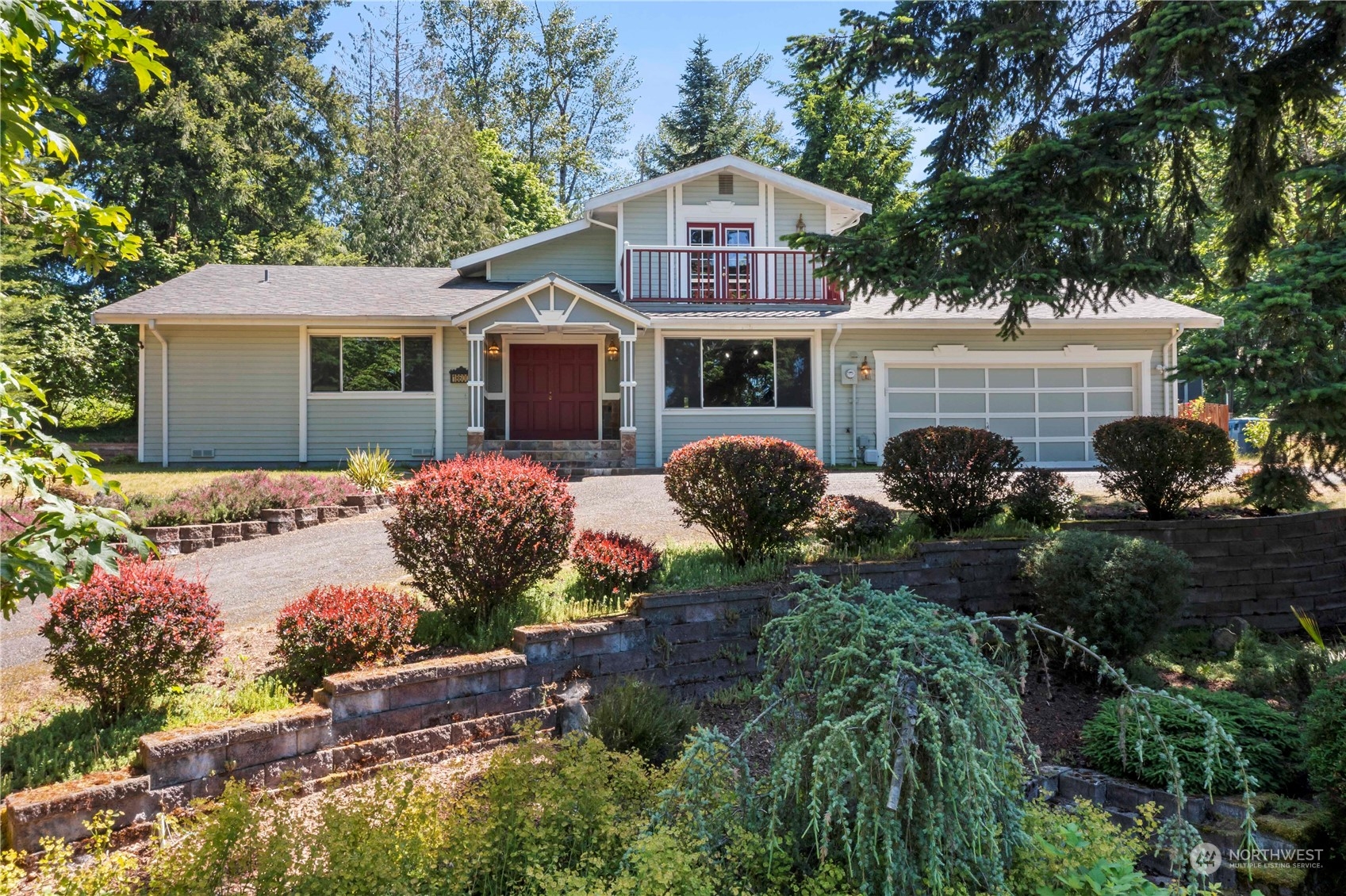 18600 East Spring Lake Drive Southeast Renton, WA 98058 - Photo 1 of 39 a front view of house with yard and trees