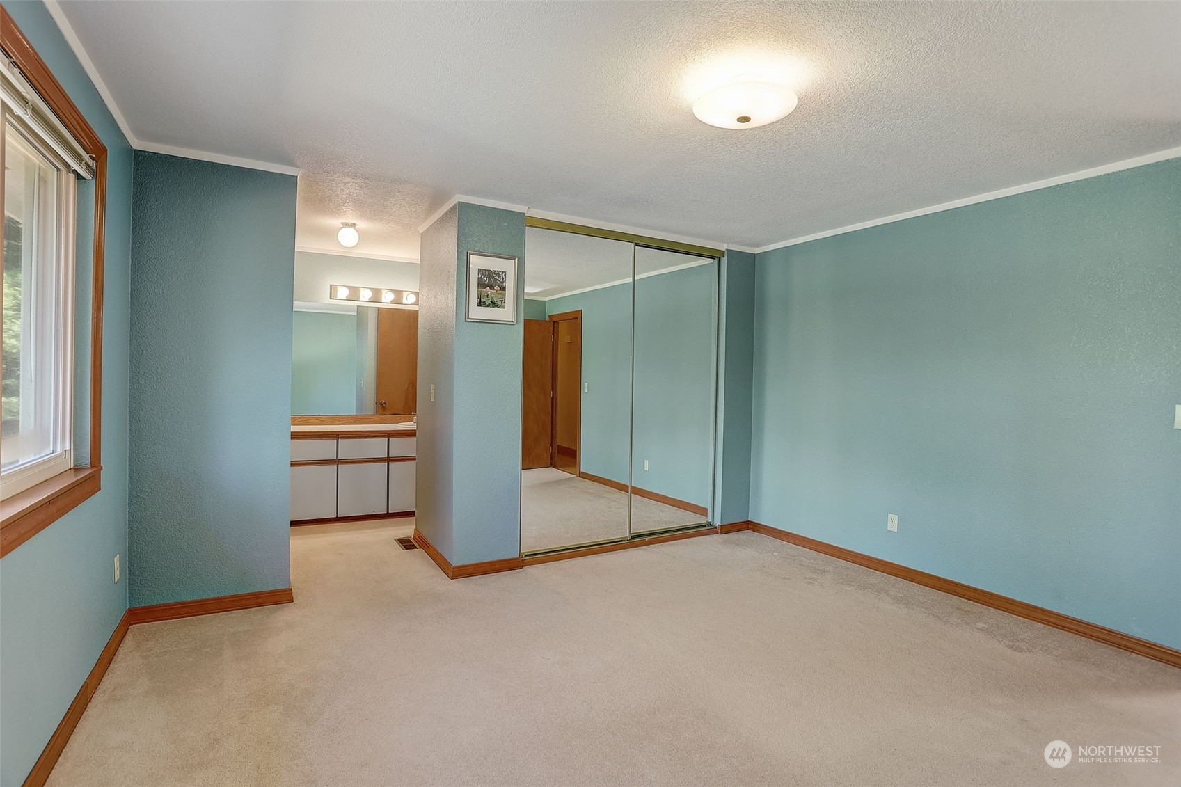 18600 East Spring Lake Drive Southeast Renton, WA 98058 - Photo 18 of 39 an empty room with windows and entrance