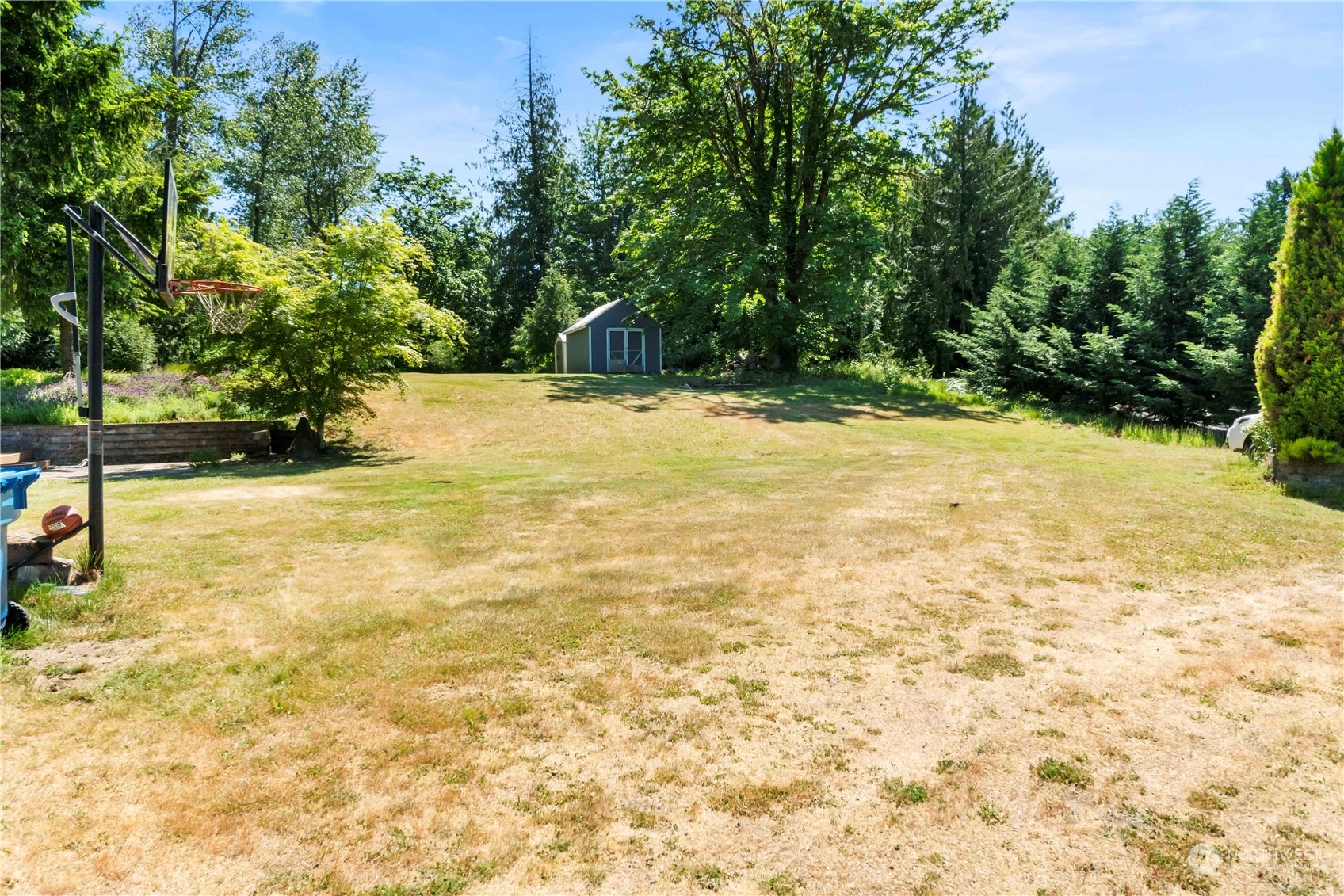 18600 East Spring Lake Drive Southeast Renton, WA 98058 - Photo 9 of 39 a view of swimming pool with an outdoor space