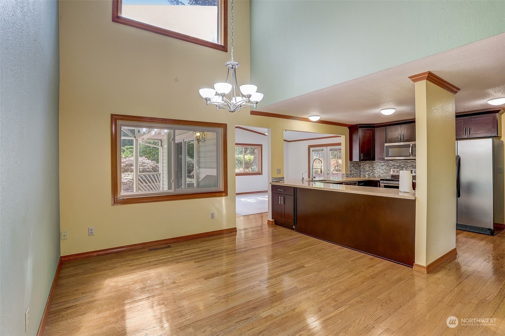 18600 East Spring Lake Drive Southeast Renton, WA 98058 - Photo 10 of 39 a view of kitchen with refrigerator and window