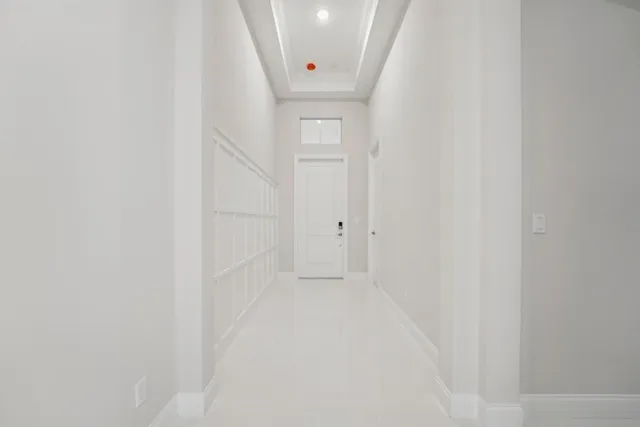a view of entryway with white walls