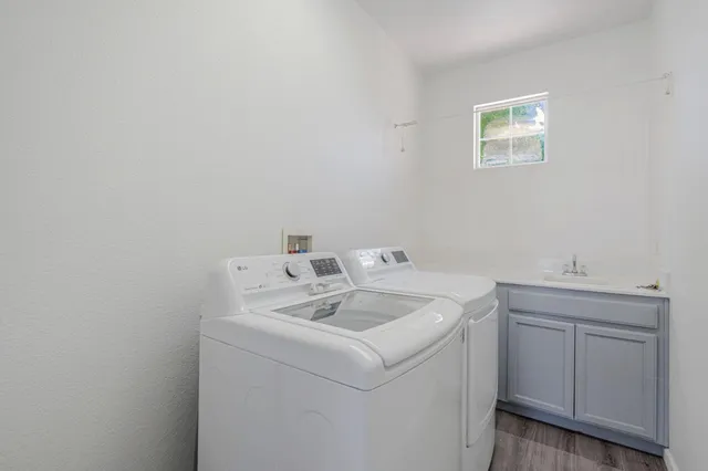 a utility room with dryer and washer