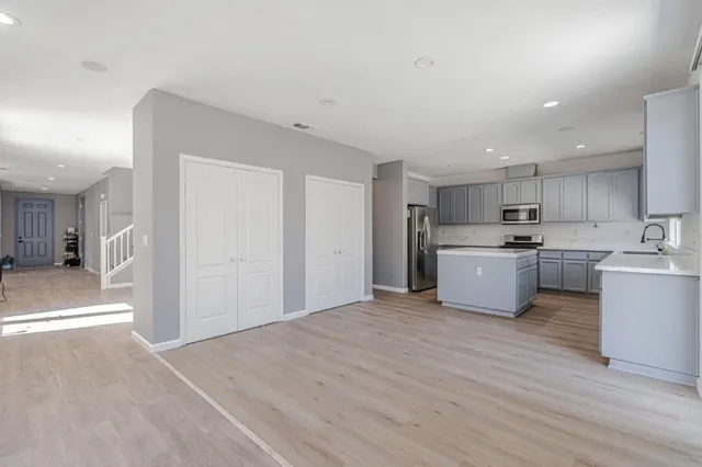 a view of kitchen with wooden floor