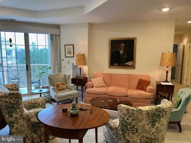 a living room with furniture and a table