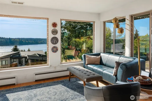 a living room with furniture and a window