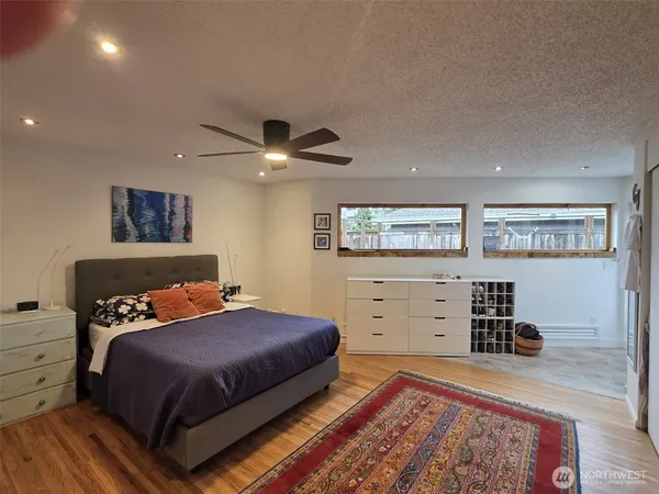 a bedroom with a bed and furniture