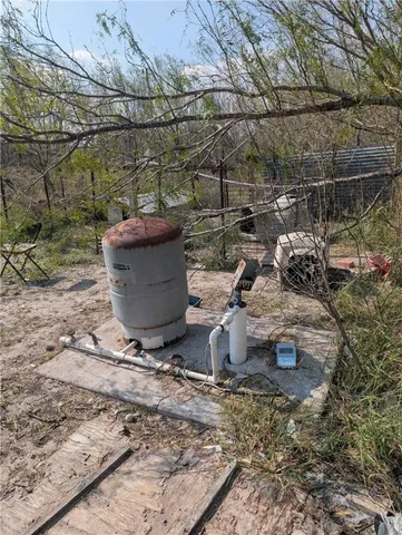 an aerial view of house with yard