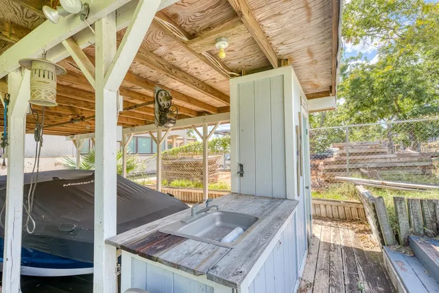 a balcony with next to a yard