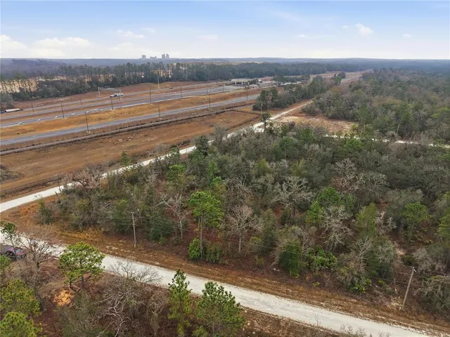 a view of a yard next to a building