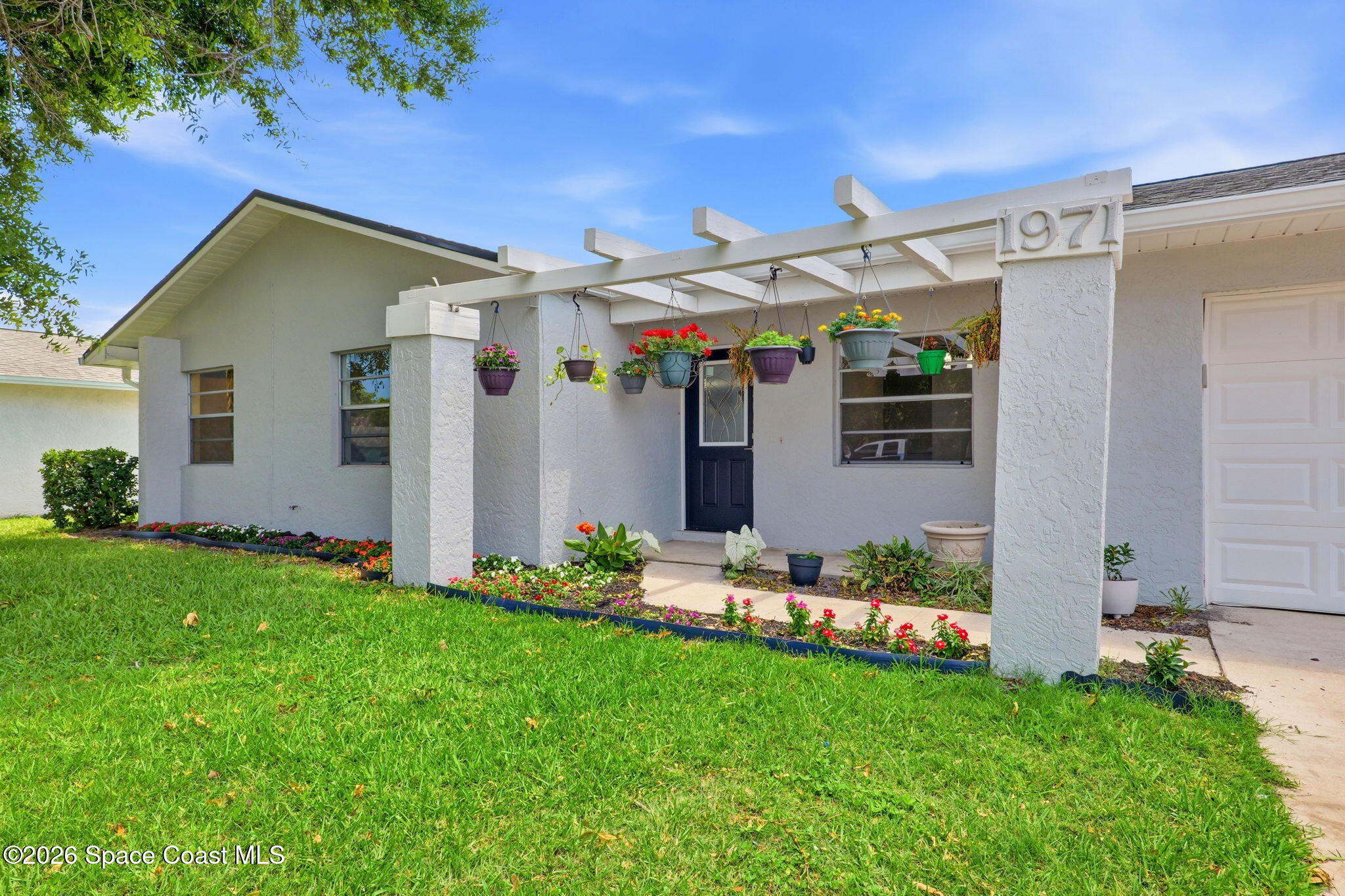 1971 Tallpalm Road Melbourne, FL 32935 - Photo 3 of 45 Front 3
